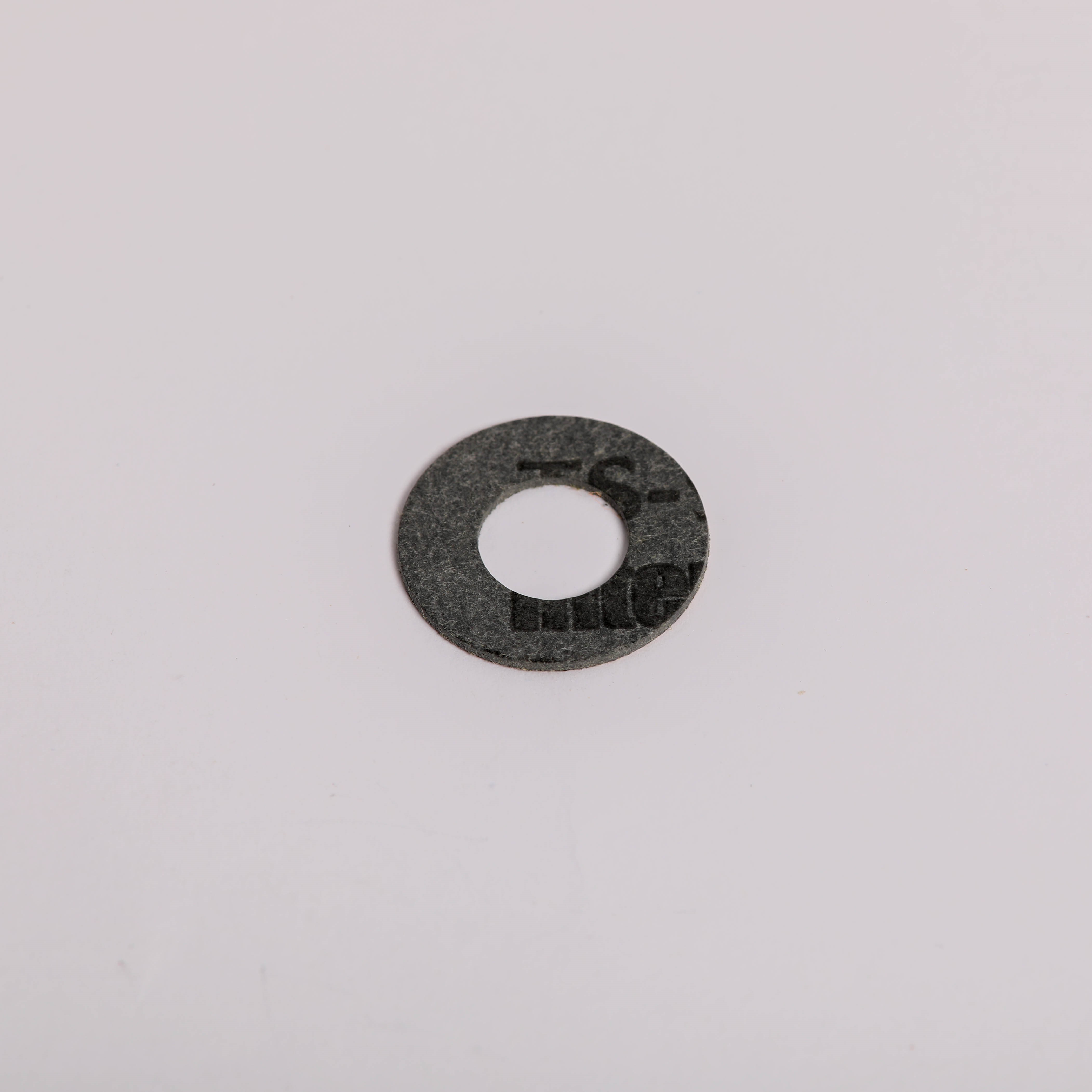 7109P084-60 WASHER, FIBER W/ADHESIVE